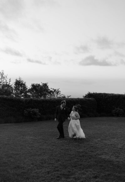 a couple embracing for their romantic engagement photos