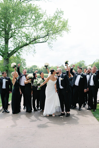Bridal party walking together at outdoor Cape May wedding