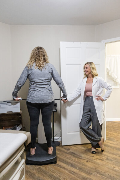 Jamie opening the door to a clinic room