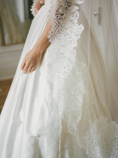 lace mantilla veil bridal detail captured on film during a Detroit, Michigan wedding at State Savings Bank