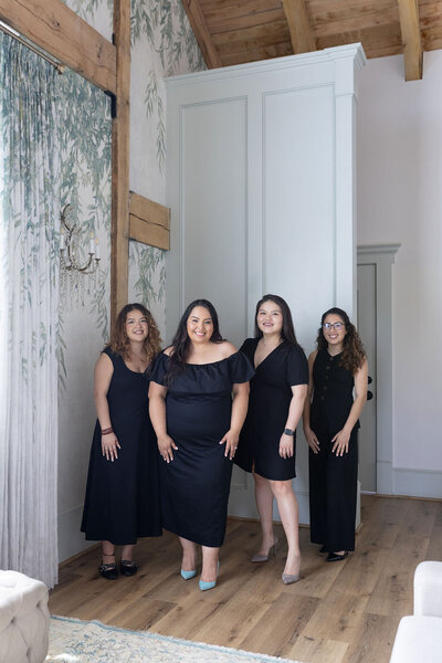 Keyla and her team in a black outfit