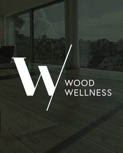 Minimalist logo design for Wood Wellness featuring a stylized 'W' with a clean diagonal line and modern typography.