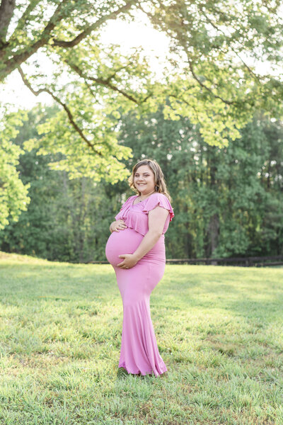 Pregnant woman holding her baby bump