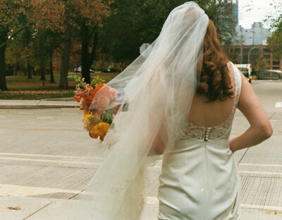 Bride walking in the North Shore with Bridal Bouquet