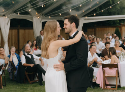 couple smiling in a garden wedding