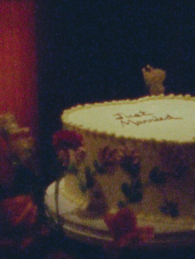 wedding cake decorated beautifully showcased in the wedding video package