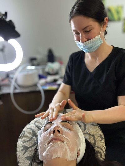 Hydrating sheet mask application using L’Académie products during facial