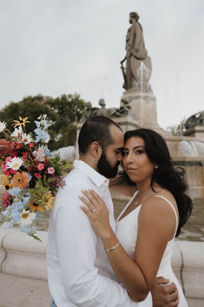 bridal couple portraits by a fountain in Colorado