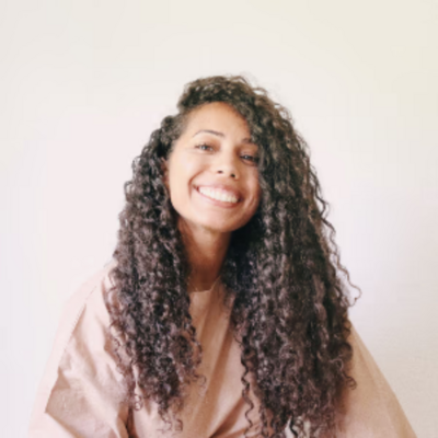 Zainab Alradhi smiles