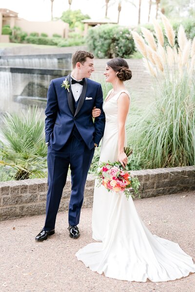 Bride and groom walk up memorial steps at their DC wedding