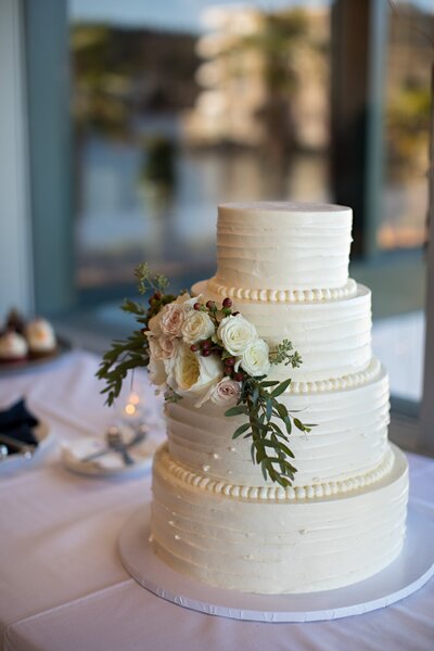 White and floral 4 tier wedding cake