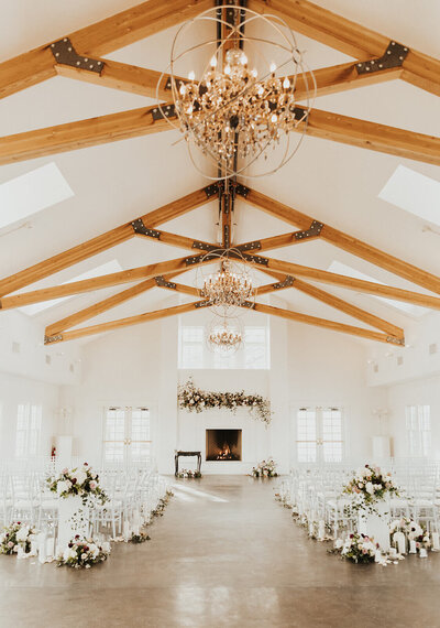 Modern Colorado Wedding Venue. White and wood ceremony set