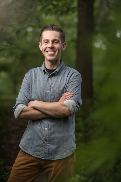 a headshot of Ohio photographer Aaron Aldhizer at a park in Northeast Ohio
