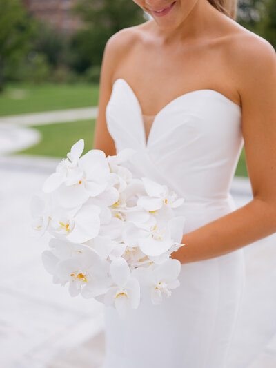 White orchid bridal bouquet for a timeless Windows on the River wedding