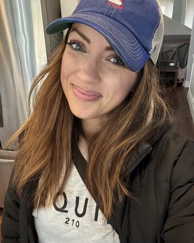 Headshot of Heather Sorenson, EQUIPPING SPECIALIST IN DIRECTOR TRAINING in Texas Rangers ball cap