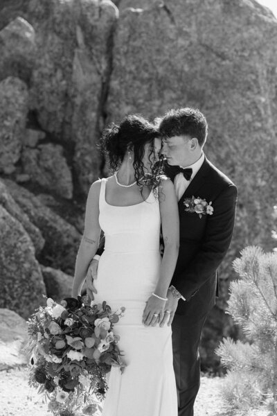 Terrel kissing Luisa at their Breezy Point Picnic Area elopement.
