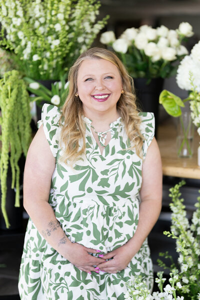 Natasha Larson designing flowers in her floral shop