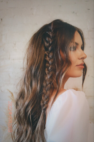 woman with long dark braided hair