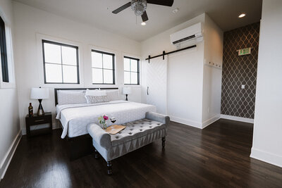 Honeymoon suite in a private space. Decorated with flowers and wine.