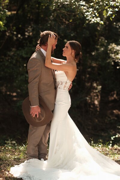 Bride and Groom sharing a quiet moment during their timeless Texas wedding planned by Everlasting Events