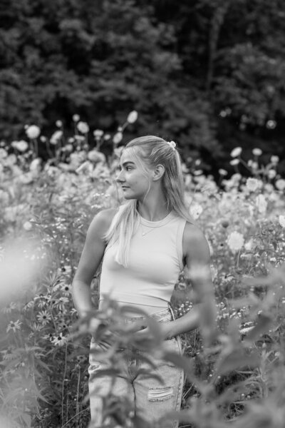 Black & White photo of girl in flower field | Graduating Senior session