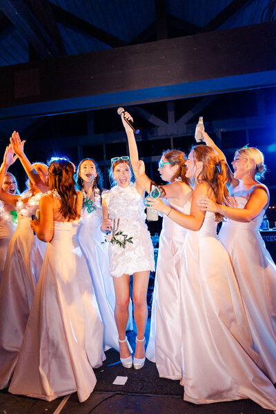 bride partying at reception in Auburn AL at Moore's Mill Club