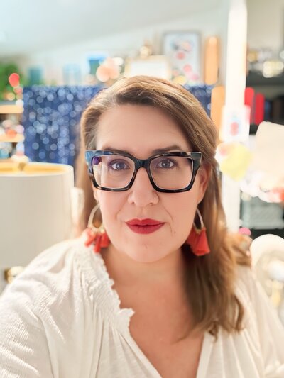 Caroline Morey Destination Wedding Photographer Self Portraits Studio Orange Tassel Earring Glasses Working 2 IMG_9282
