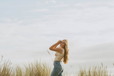 girl standing in river at washington nature park