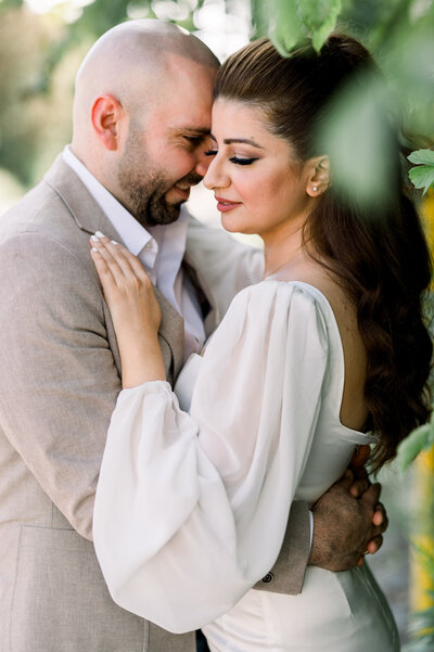 Toronto Wedding Photographer - couple facing and hold each other