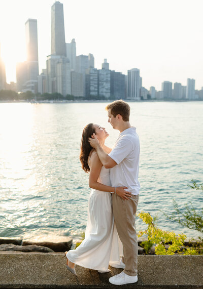 Couple about to kiss during an engagement session in downtown Chicago