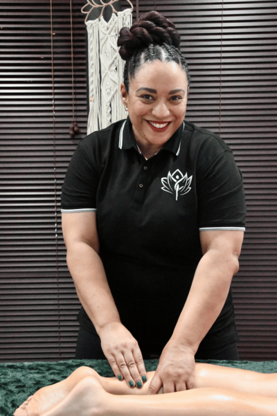 Photo of April Health, smiling , wearing a black shirt