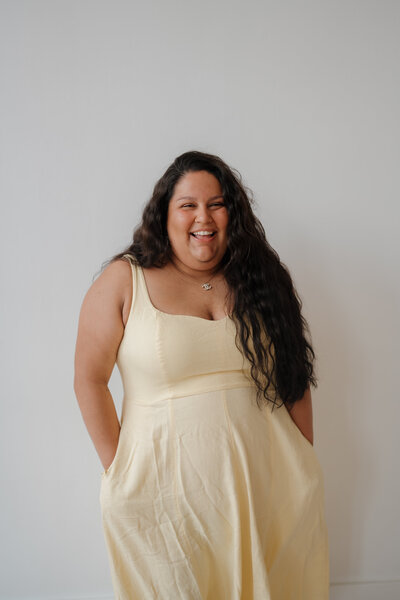 A portrait of a wedding photographer in a studio. 
