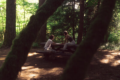 couple sitting on bench together