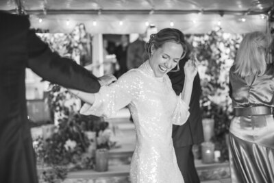 black and white photo of dancing at wedding reception