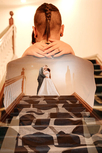 he bride and groom stand on the rocks, embracing as the sun sets, casting a romantic glow around them.