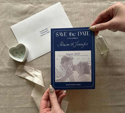 Blue custom design save the date with calligraphy names