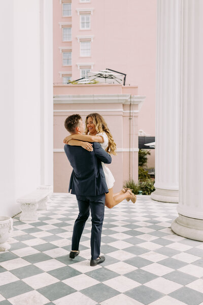 Groom twirling bride in charleston south carolina elopement