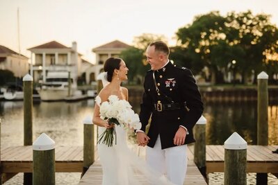 Wedding Couple on Waterfront Dock at Palafox Wharf after their Ceremony in Pensacola, Florida