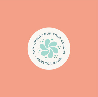 Colorful floral camera shutter logo on bright coral background