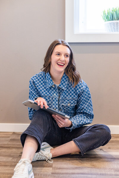 Headshot with computer and jean jacket