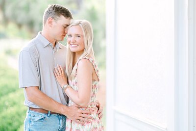 Engaged couple posing at Kiesel park in Auburn