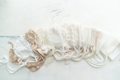 large variety of white bonnets