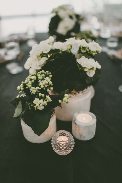 Flowers and candles on a table