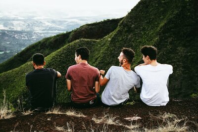 men sitting matheus-ferrero-TkrRvwxjb_8-unsplash(2)