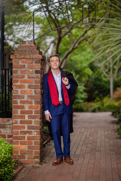 A University of South Carolina student taking his senior portraits on campus