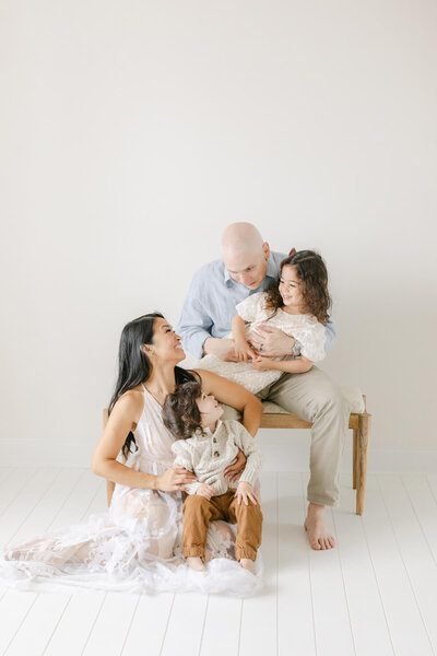 busy omaha mom shares a special moment with her children in a family photography session