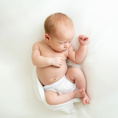 Louisville KY Newborn Photographer, Julie Brock, poses babies naturally without using props