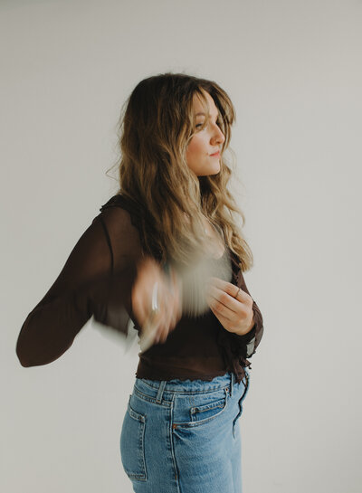 Two hairstylists working inside of Tone Salon Fortville, providing the best salon services int he area. One stylist is blonding, the other is applying gray coverage and balayage.