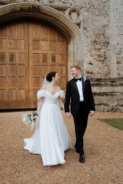 bride holding dress