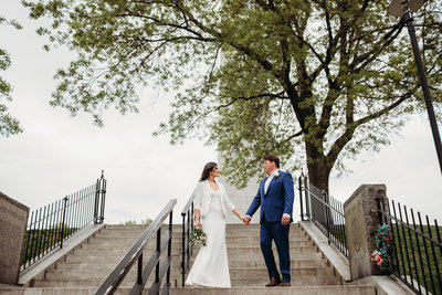 couple exchanges vows on steps in charlestown
